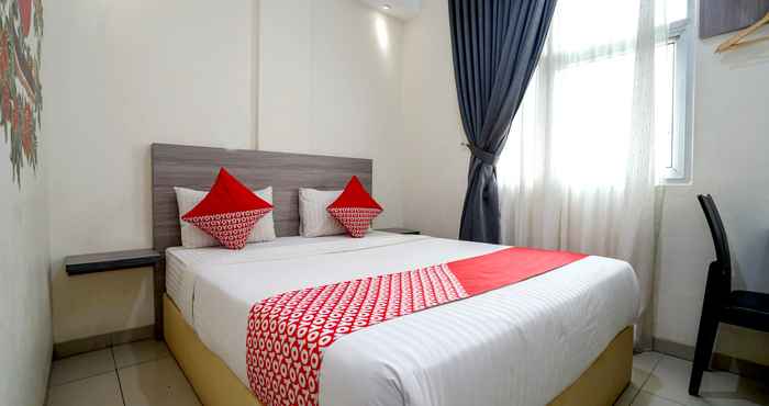 Kamar Tidur The Maximus Inn Hotel