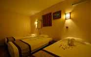 Kamar Tidur 3 Family Treasure Hotel