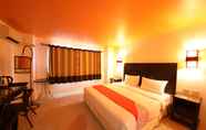 Kamar Tidur 3 OYO 126 Patong Station House