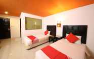 Kamar Tidur 2 OYO 126 Patong Station House