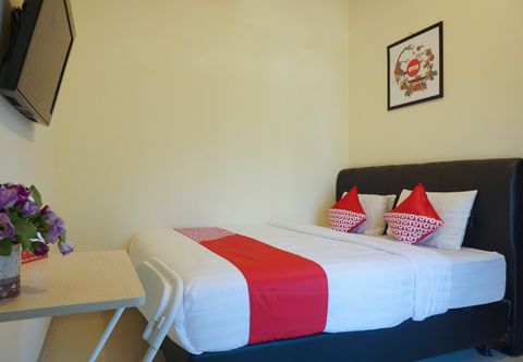 Bedroom OYO 895 Mahameru Residence Near RS Condong Catur