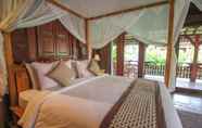 Kamar Tidur 6 Ari Cottages Ubud