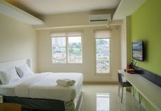 Kamar Tidur 6 Convenient Studio at Galeri Ciumbuleuit 2 Apartment by Travelio