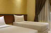 Kamar Tidur Emer One Hotel Batusangkar