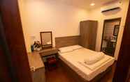 Kamar Tidur 4 Sea Town Travel Apartment