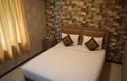 Kamar Tidur 3 Ray Inn Hotel