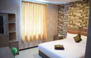 Kamar Tidur 6 Ray Inn Hotel