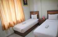 Bilik Tidur 4 Ray Inn Hotel