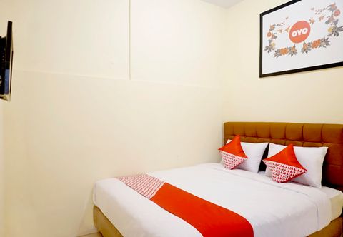 침실 OYO 702 Ganesha Homestay