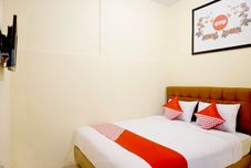 침실 OYO 702 Ganesha Homestay