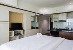 Kamar Tidur 6 City View Studio Apartment at Tamansari La Grande by Travelio