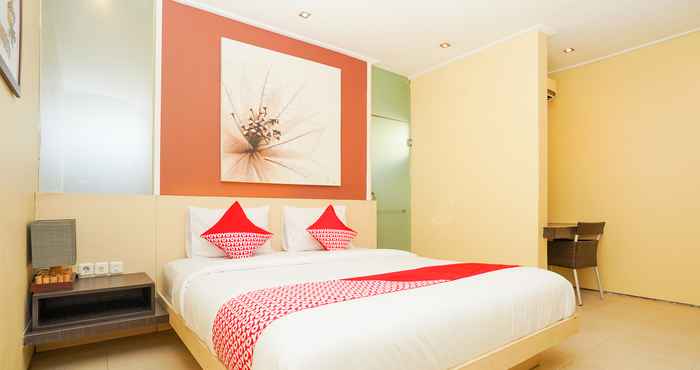 Kamar Tidur OYO 216 Elinoki Guest House