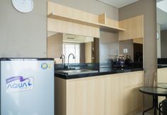 Bedroom 5 Strategic Studio Apartment at Tamansari La Grande near BIP by Travelio