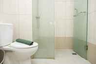 In-room Bathroom Strategic Studio Apartment at Tamansari La Grande near BIP by Travelio