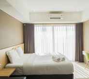 Bedroom 7 Strategic Studio Apartment at Tamansari La Grande near BIP by Travelio