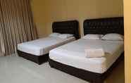 Kamar Tidur 4 Grand Cendana Inn