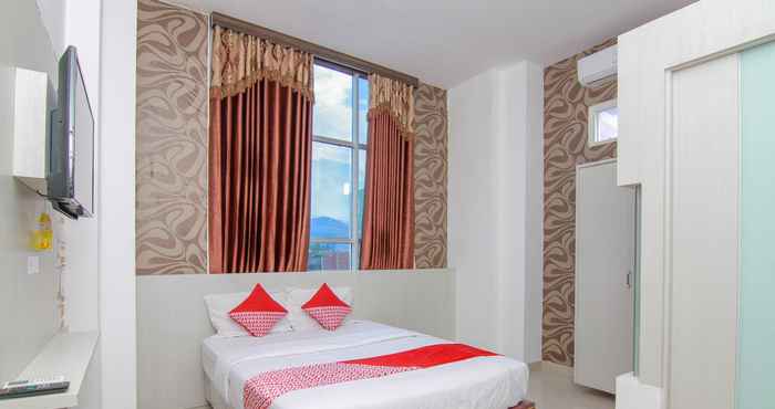 Phòng ngủ OYO 861 R Four Hotel