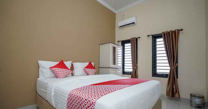 Bedroom OYO 959 Graha Ham Family