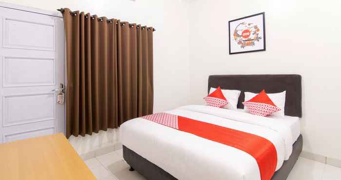 Kamar Tidur OYO 966 Dinda Guesthouse