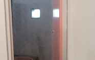 In-room Bathroom 7 Penginapan Syariah Demak 