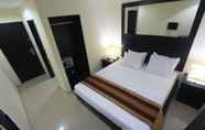 Kamar Tidur 3 Kuta Airport Insta Hotel