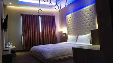 Kamar Tidur 4 Octo Hotel Cirebon