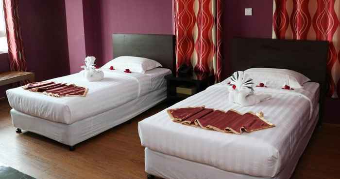 Kamar Tidur Beauty Land Hotel Bo Cho