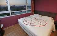 Bedroom 2 Beauty Land Hotel Bo Cho