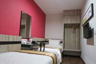 Kamar Tidur 4 Meriton Inn