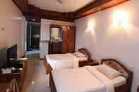 Kamar Tidur Royal White Elephant Hotel