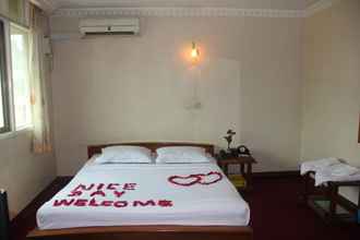 Kamar Tidur 4 Nice Day Hotel