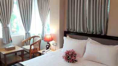 Phòng ngủ 4 Grand Laurel Hotel 