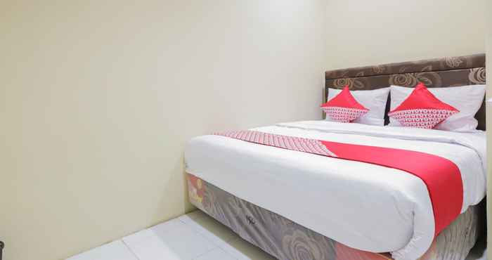 Kamar Tidur OYO 544 Caraka Inn Syariah