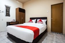 침실 Hotel O Palem Mas Garden