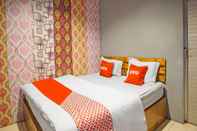 Bedroom OYO 990 Stadion Residence Syariah