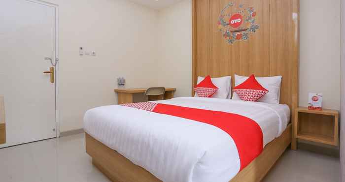 Kamar Tidur OYO 999 Garuda Guesthouse