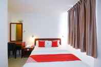 Bedroom OYO 989 Ostay Inn