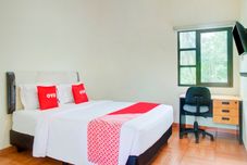 ห้องนอน OYO 3734 Ramboe Ranca