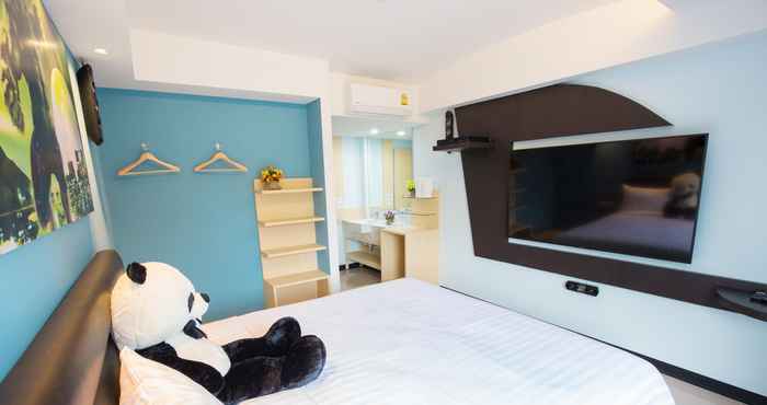 ห้องนอน Lucky Panda Hotel