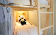 ห้องนอน 4 Lucky Panda Hotel