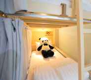 Kamar Tidur 4 Lucky Panda Hotel