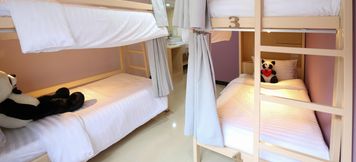 ห้องนอน 3 Lucky Panda Hotel