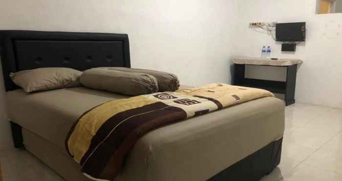 Kamar Tidur Mr.R.Homesstay