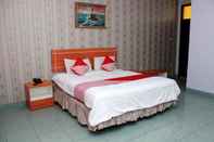 Kamar Tidur Raffles City Hotel