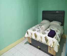 Kamar Tidur 4 Raja Guest House