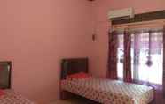 Kamar Tidur 5 Arnold Homestay