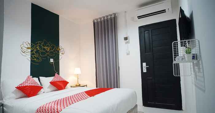 ห้องนอน OYO 1125 Sani Guest House