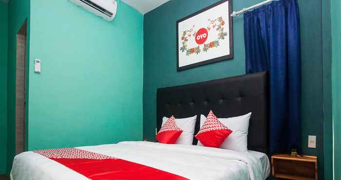 Bedroom Super OYO 1052 Sentosa Jaya Guest House Syariah