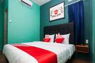Bedroom Super OYO 1052 Sentosa Jaya Guest House Syariah
