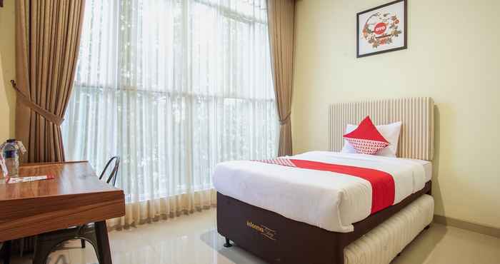 Kamar Tidur OYO 1241 Eirini Family Homestay